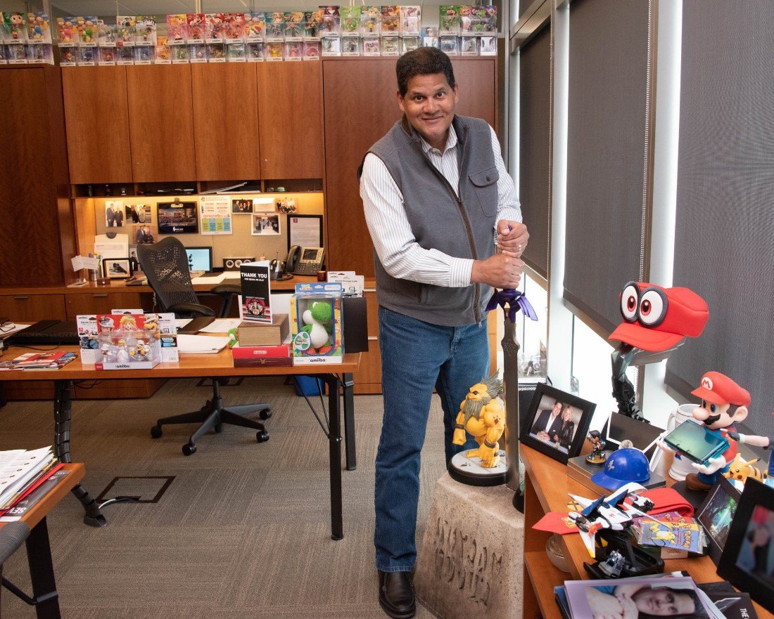 Reggie's collection of Nintendo swag would make any fan envious (Image: Twitter)